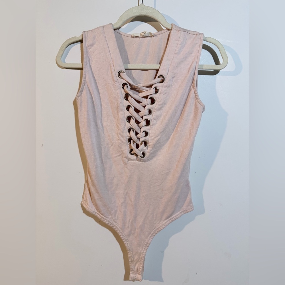 Lace-Up Pink Women’s One-Piece Bodysuit